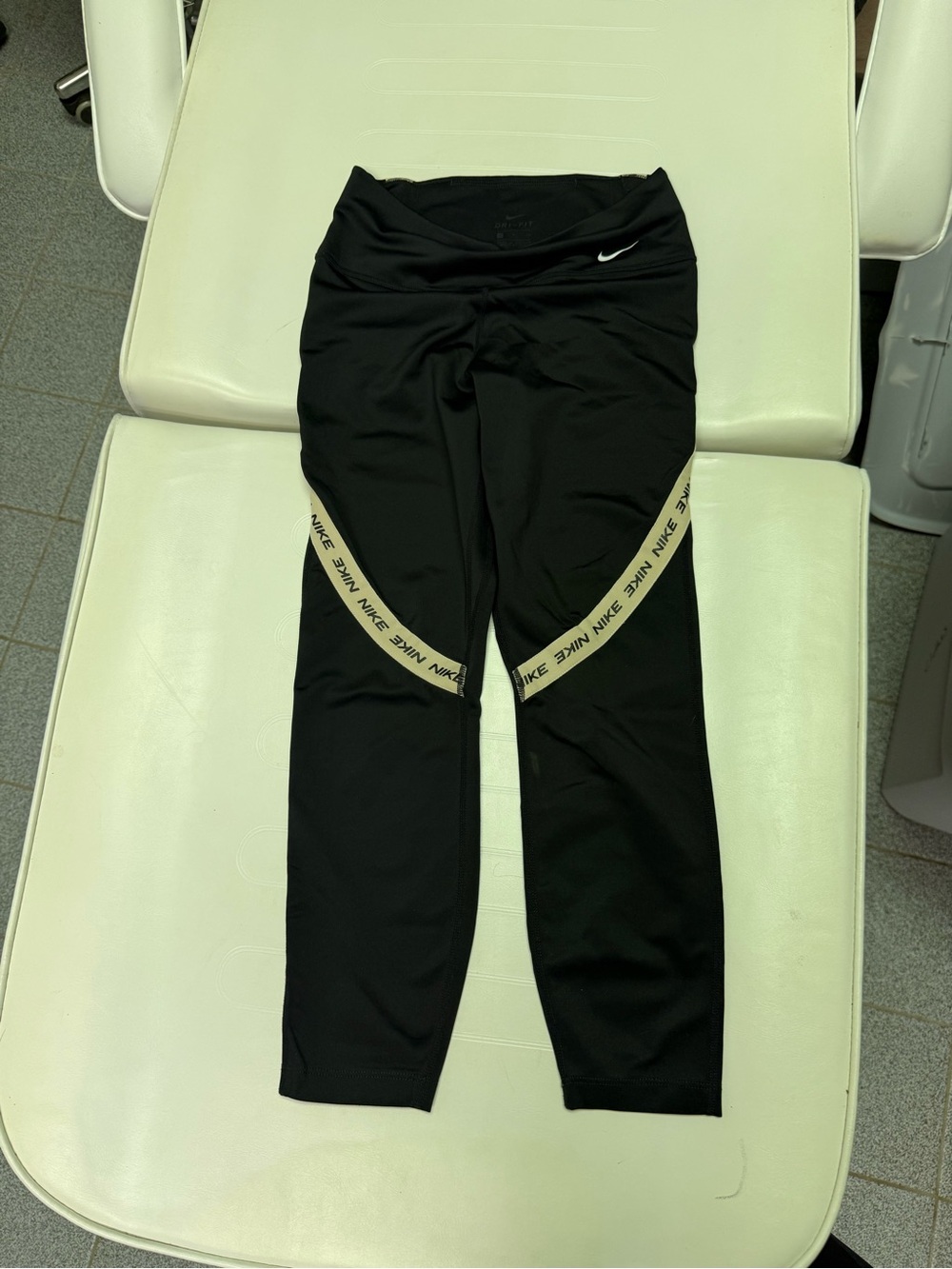 Nike Kids Black Leggings with Cream Logo Trim